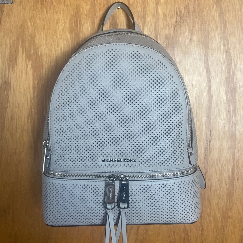 NWT Michael Kors Rhea Zip signature backpack Perforated leather in Cement color